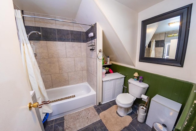 bathroom with toilet and shower / bathtub combination with curtain