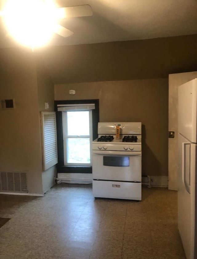 kitchen featuring white appliances