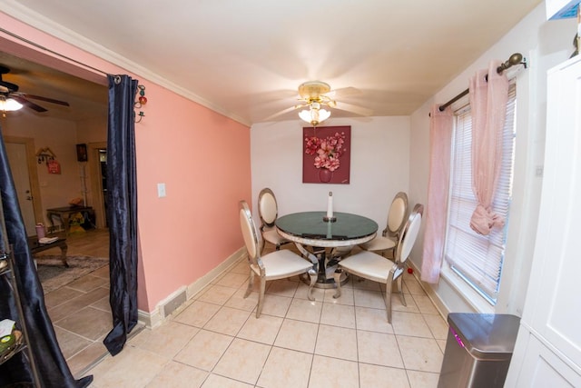 dining area with ceiling fan and light tile patterned floors