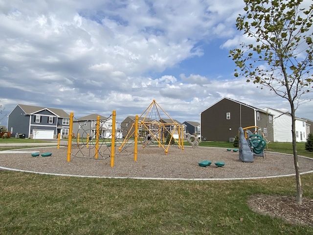 view of playground featuring a lawn