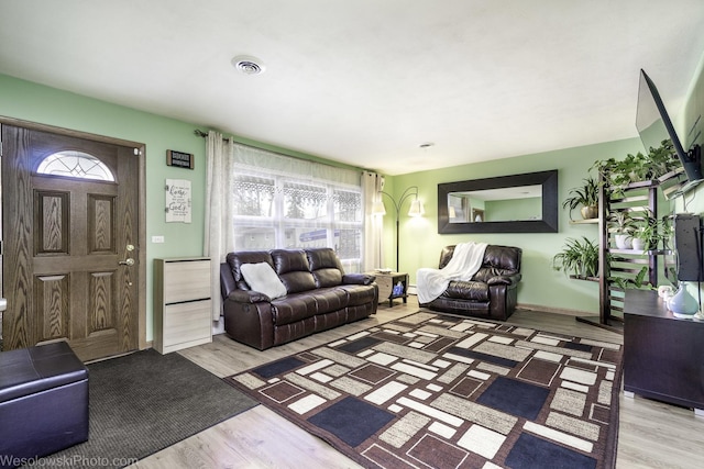 living room featuring light wood-type flooring