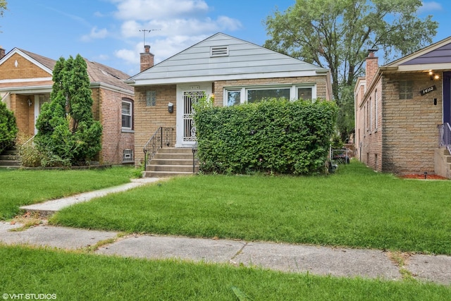 bungalow with a front yard