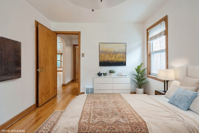 bedroom with light hardwood / wood-style flooring