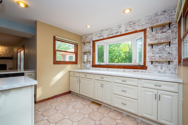 bathroom with vanity and backsplash