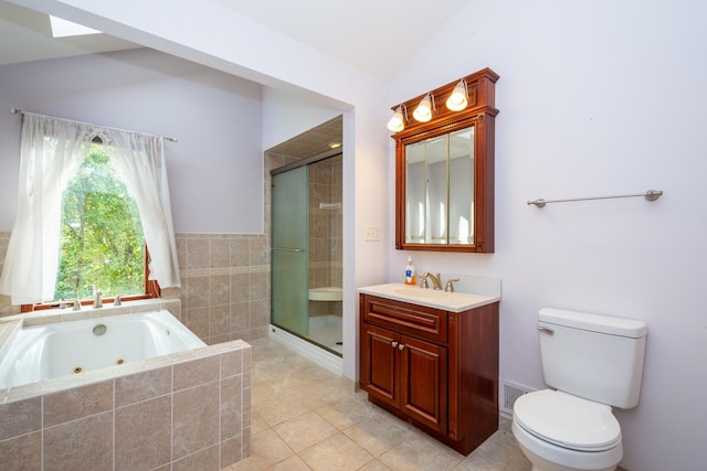 full bathroom with vanity, vaulted ceiling, tile patterned floors, independent shower and bath, and toilet