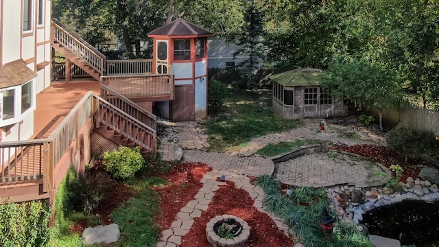 view of yard with an outdoor structure and a patio area