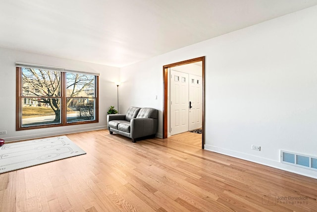 unfurnished room with light hardwood / wood-style flooring