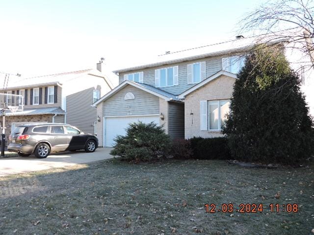 front of property with a garage