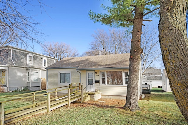 view of front of home with a front yard