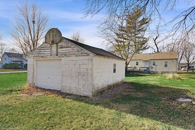 garage with a lawn