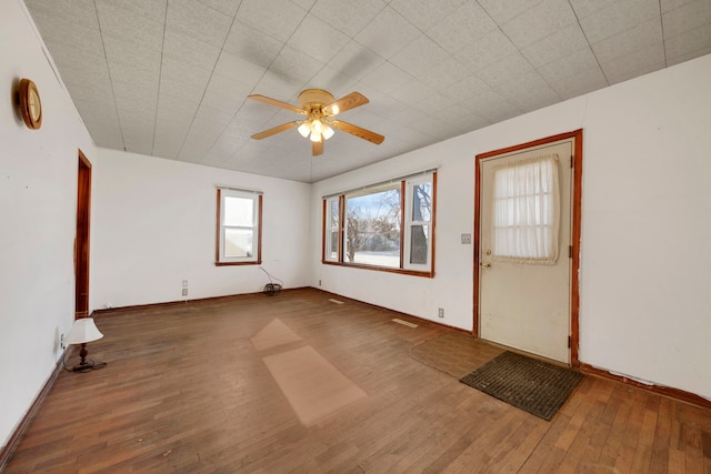 foyer featuring dark hardwood / wood-style floors and ceiling fan