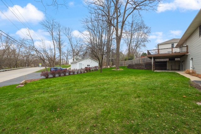 view of yard with a deck