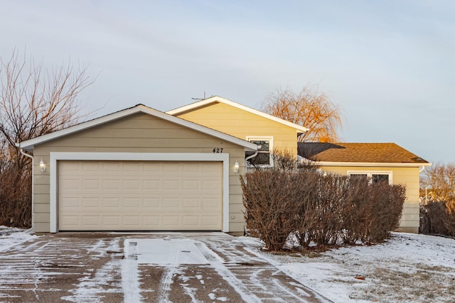 view of front of home with a garage