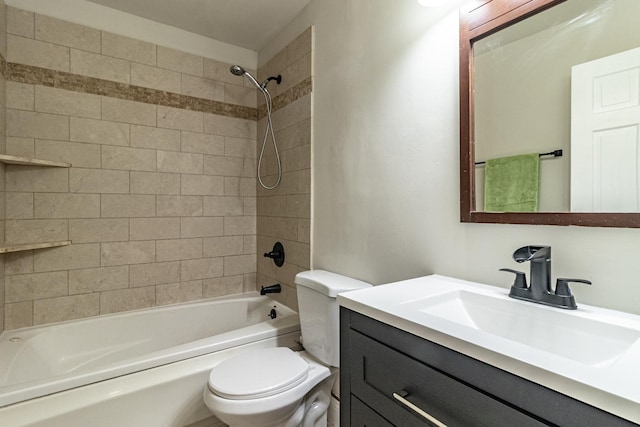 full bathroom featuring vanity, toilet, and tiled shower / bath