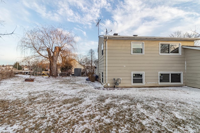 view of snow covered property