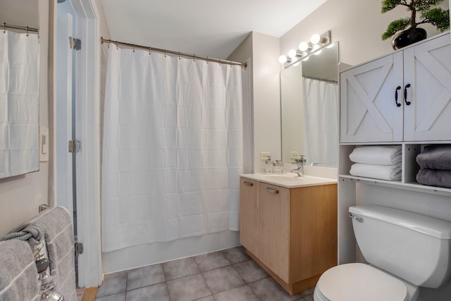 full bathroom with toilet, shower / bath combination with curtain, vanity, and tile patterned floors