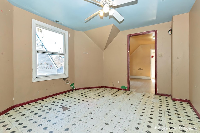 bonus room featuring ceiling fan and vaulted ceiling