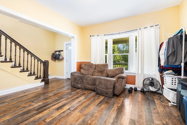 living room featuring dark hardwood / wood-style flooring