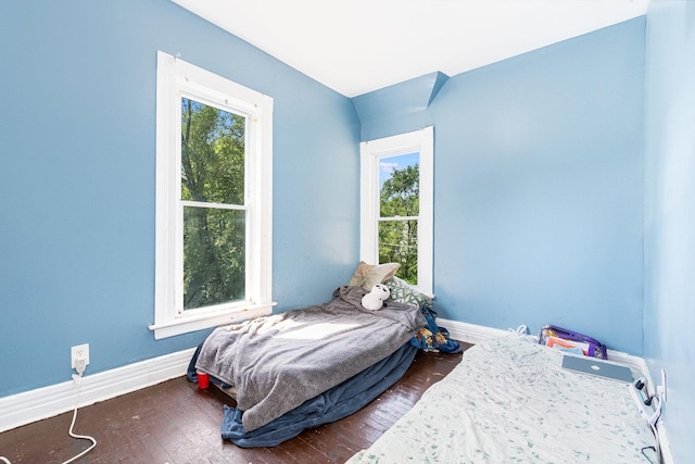 bedroom featuring dark hardwood / wood-style floors