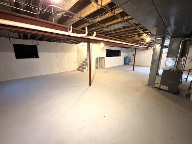 basement featuring heating unit