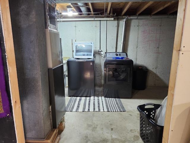 basement with washer and dryer