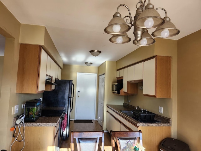 kitchen with white cabinets, black electric range oven, dark wood-type flooring, and pendant lighting