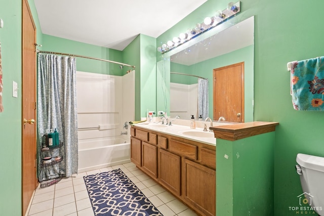 full bathroom with tile patterned floors, vanity, toilet, and shower / tub combo