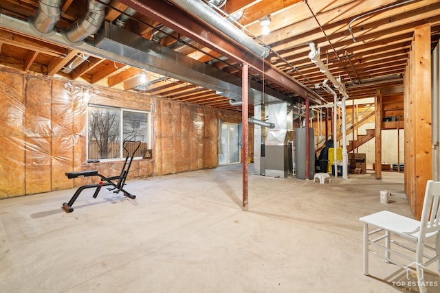 basement with gas water heater and heating unit