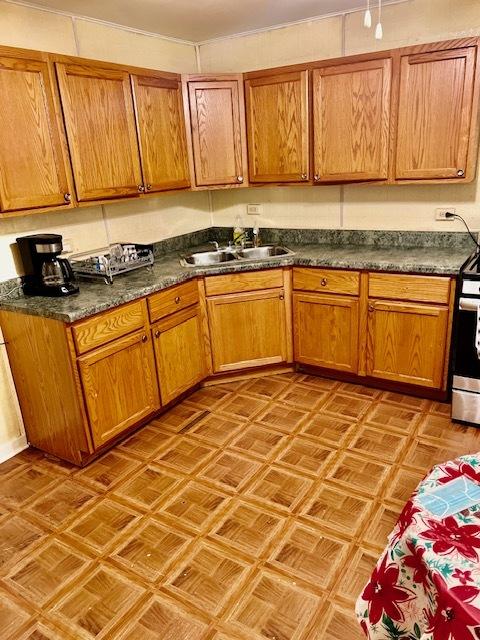 kitchen with sink and stainless steel stove