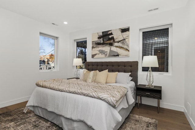 bedroom featuring hardwood / wood-style flooring