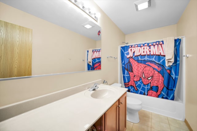 full bathroom with tile patterned floors, shower / tub combo with curtain, vanity, and toilet