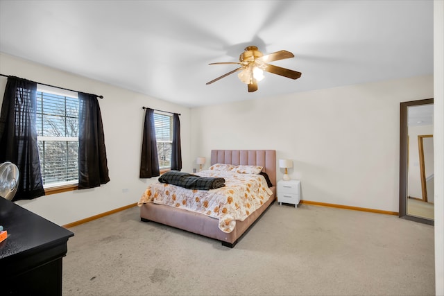 bedroom with ceiling fan and carpet