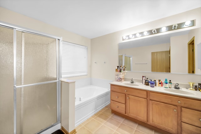 bathroom featuring tile patterned floors, vanity, and independent shower and bath