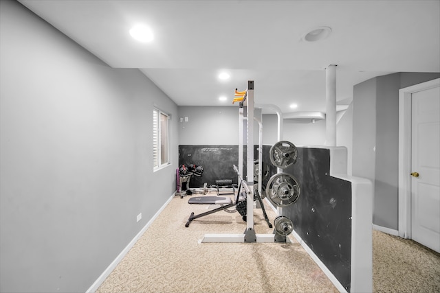 exercise room featuring carpet flooring