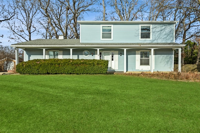 view of front facade featuring a front yard