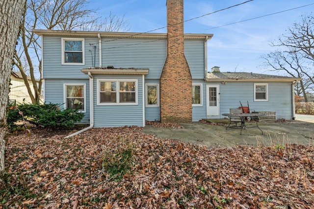 rear view of house with a patio area