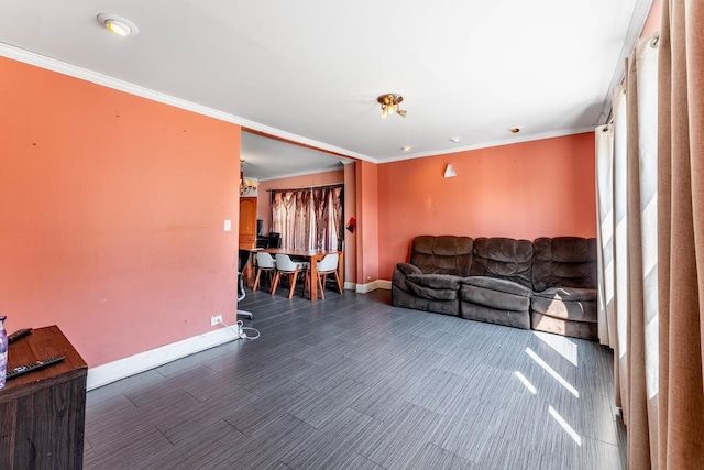 living room with ornamental molding