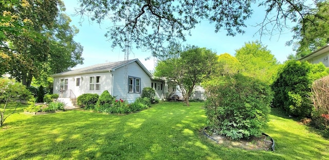 exterior space featuring a lawn