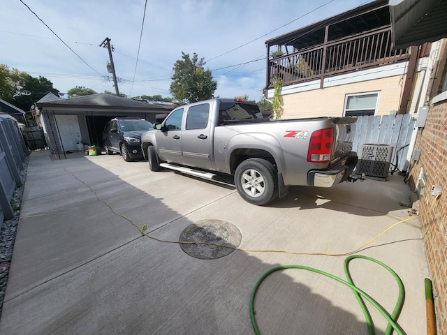 view of parking with a garage