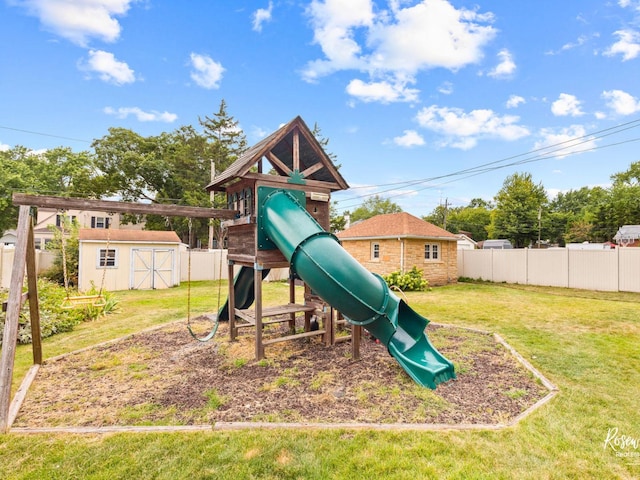 view of jungle gym featuring a storage shed and a yard