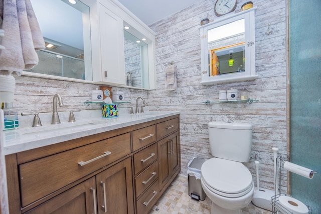 bathroom featuring vanity, wooden walls, decorative backsplash, toilet, and walk in shower