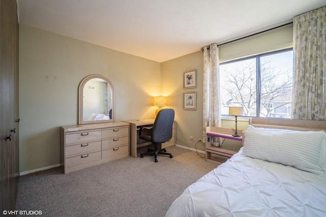 bedroom with light colored carpet