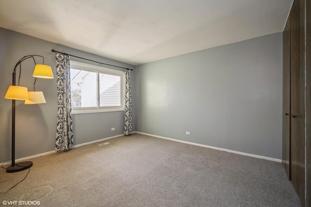 view of carpeted spare room