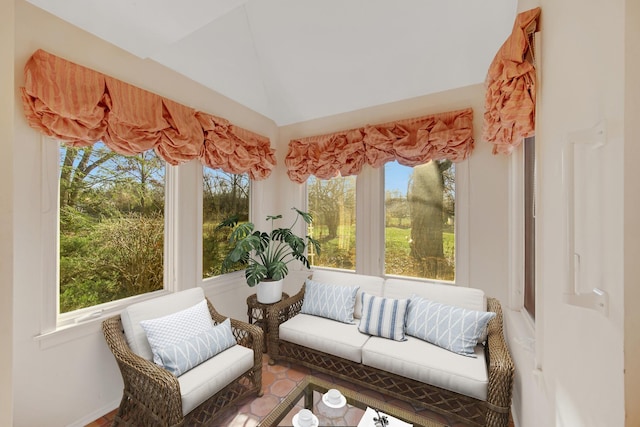 sunroom / solarium with vaulted ceiling