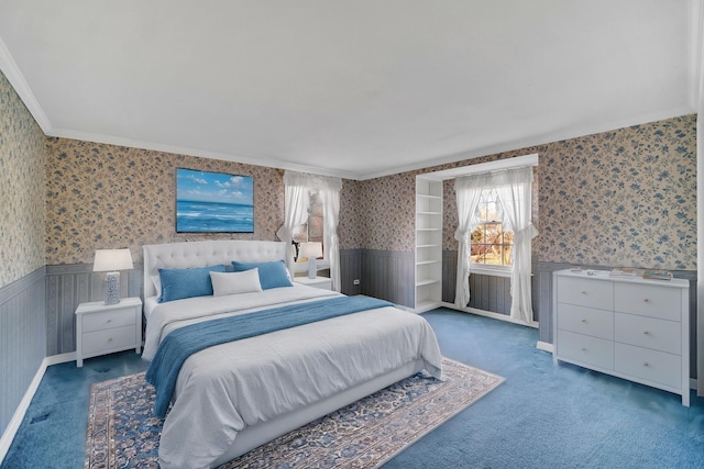 carpeted bedroom featuring ornamental molding