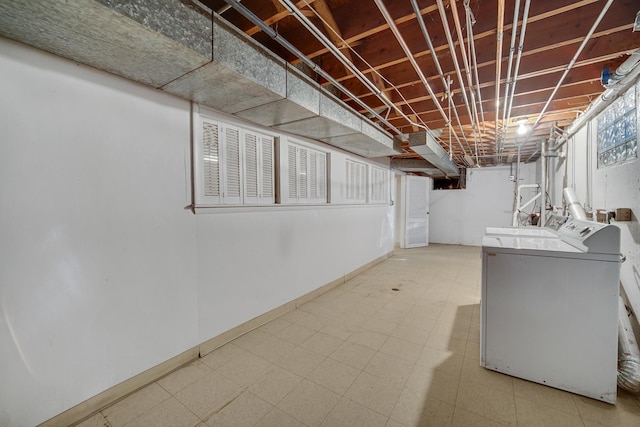 basement featuring separate washer and dryer