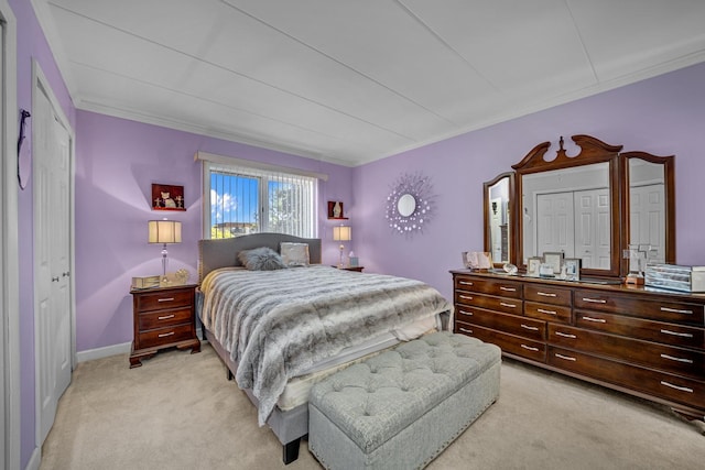 carpeted bedroom featuring crown molding