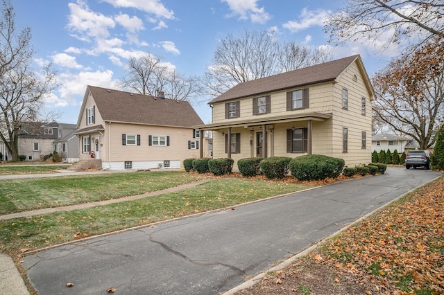 view of front of house with a front lawn