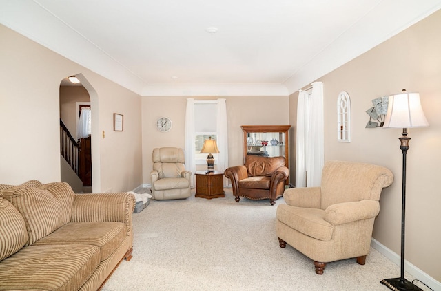 living room featuring light carpet