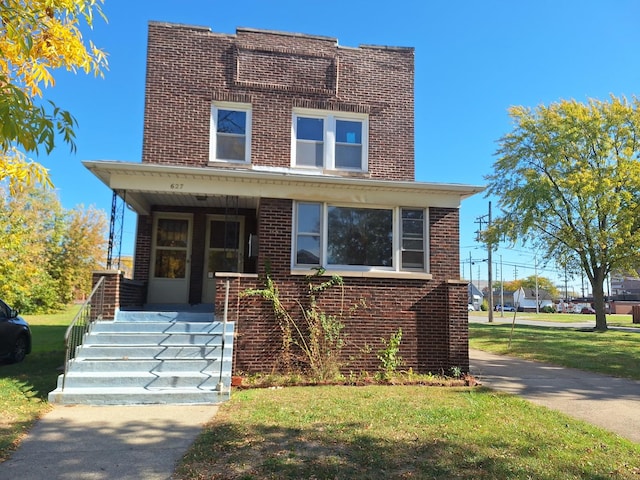 view of front facade with a front yard